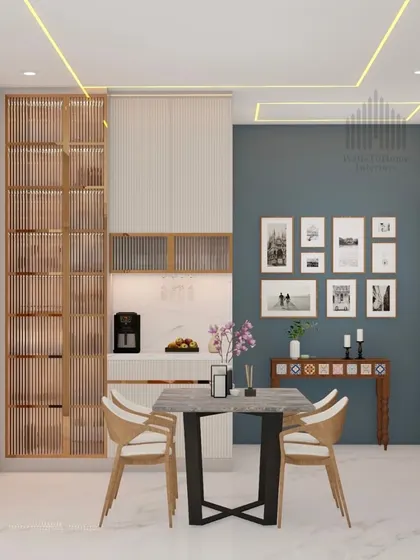 A dining area render that combines natural wood textures with a cool blue accent wall and a gallery of framed photos, creating a personal and stylish space.