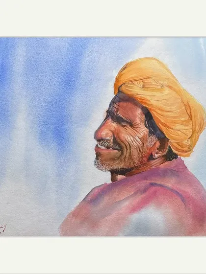 'Wisdom of the Desert' is a watercolour portrait capturing the spirit of Rajasthan. The side profile allowed me to focus on the strong features and the bright yellow turban against a simple blue sky.