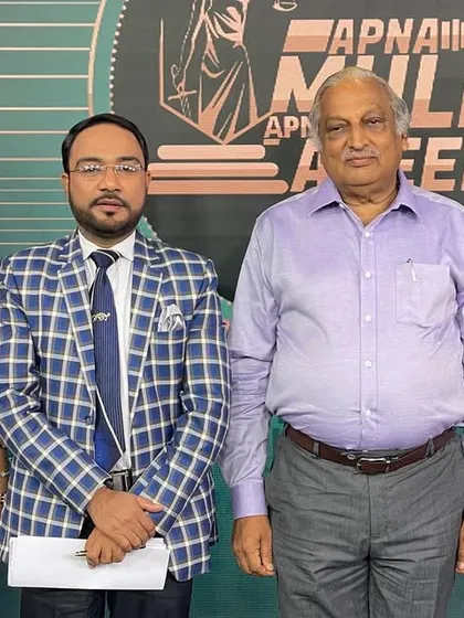 Posing with the host and panelists after a productive recording session. I am always ready to contribute my legal expertise to public platforms.