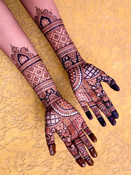 A clear, well-lit photo of the full-arm bridal design, showing the excellent contrast and detail.