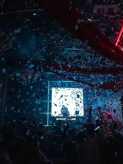 A moment of pure visual chaos with lasers and confetti filling the air. This is the kind of organized madness I love to create during my sets.