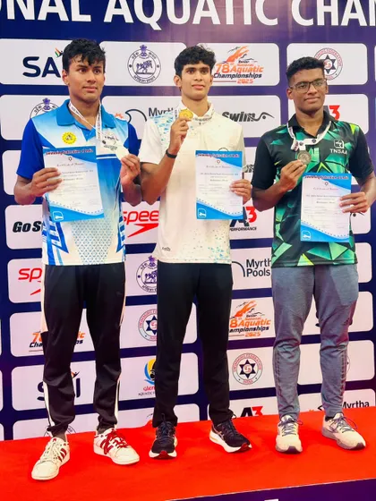 A podium shot showing the BAC dominance in the Men's 200m Backstroke.