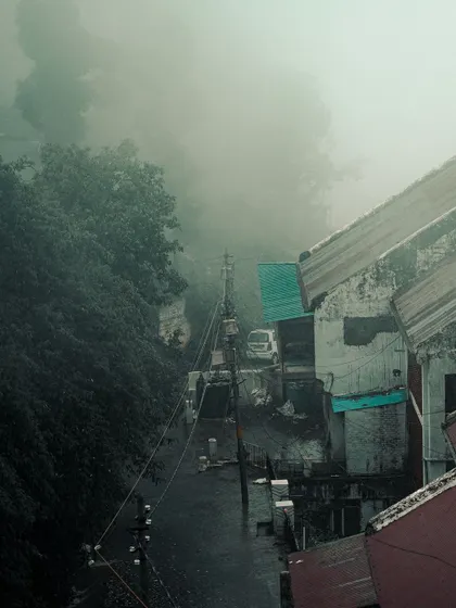 A foggy, moody street scene in Mussoorie during the monsoon. This photo captures the mysterious and atmospheric side of the hill station.