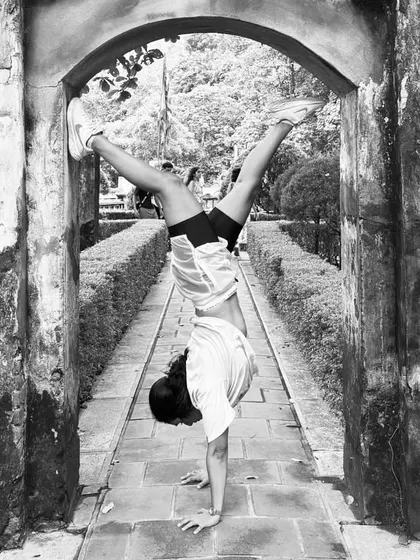The same handstand, but in black and white. It highlights the form and the feeling of being upside down. Changing your physical perspective can often help shift your mental one too.