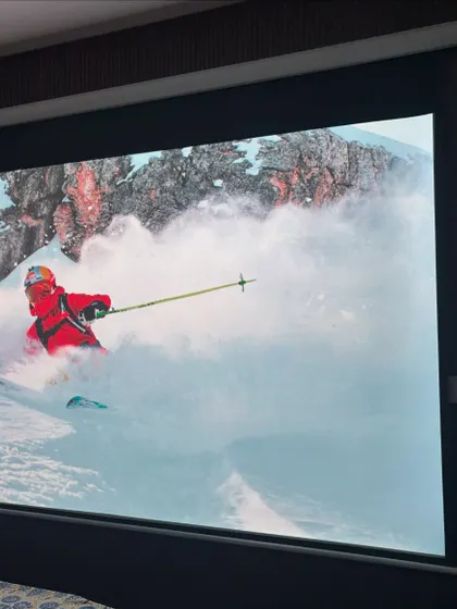 Why limit the big screen to the living room? This bedroom setup features a giant screen that makes you feel like you're right in the middle of the action. The vibrant 4K picture quality turns any movie night into a memorable event.