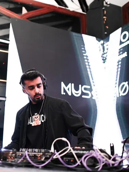 Another shot of me at a bright event, showing my concentration and professional demeanor. Ready for any kind of gig.