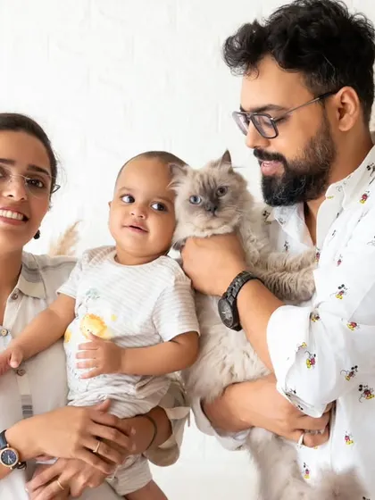 A complete family portrait that includes the beloved family cat. I welcome pets in my studio sessions to ensure every member of your family is part of the memory.