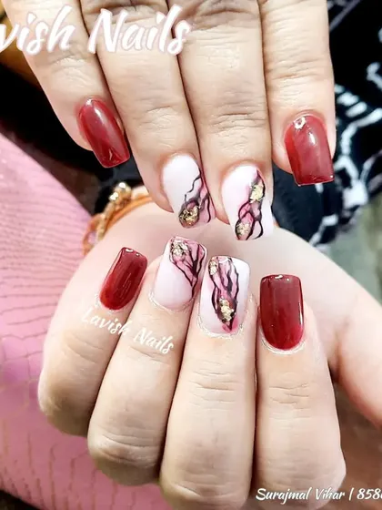 A beautiful abstract design combining deep red with a pink and white marble effect, highlighted with delicate gold foil.