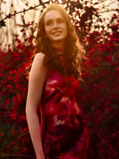Shot during the golden hour, this portrait is a perfect harmony of subject and setting. We learn to use natural light and the environment to complement the styling and create a soft, romantic mood.