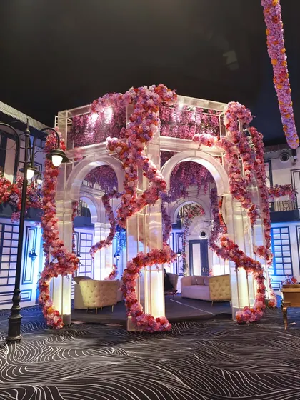 A Parisian-themed event setup, where our food stations were designed to look like charming European street-fronts. This level of thematic detail is what sets our corporate catering apart.