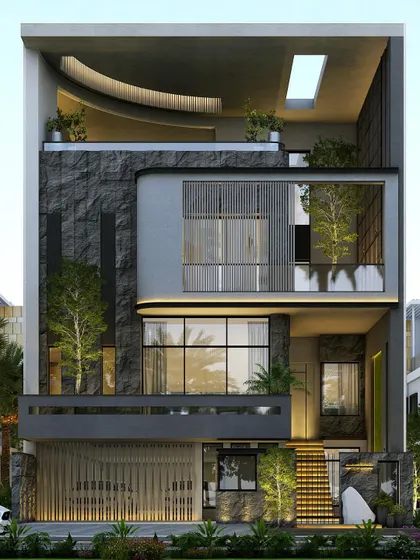 This design for a home in Shubham Enclave features a dramatic, dark stone facade and a large, covered terrace, creating a powerful and contemporary look.