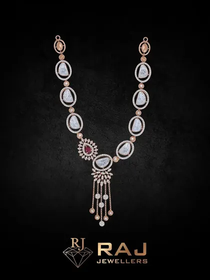 This necklace is a perfect example of how jewellery can set you apart. The long design features a simple chain of polki stones, culminating in a tassel-like pendant that adds a touch of modern glamour.