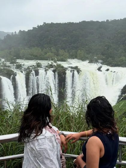 Two friends enjoying the spectacular view of Jog Falls in its full monsoon glory.