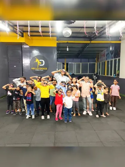 Our little superstars posing with sunglasses. These playful photoshoots are a fun break from dance practice and always result in great pictures.