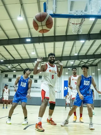 Boxing out for a rebound. Fundamentals like this are the key to controlling the game's tempo.