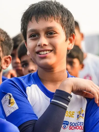 Young players at our SSE BFC program look on with excitement during a visit from former India Captain Renedy Singh.