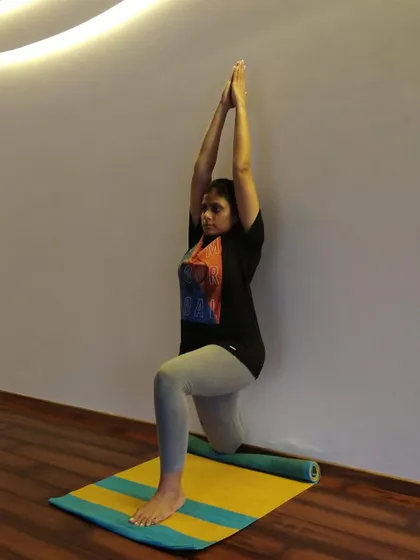 Another variation of a supported lunge, demonstrating how we can use the wall to find stability and length.