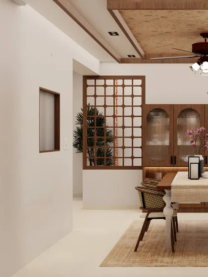 My client Bhuvana wanted a crockery unit that didn’t feel bulky. I designed this piece with fluted glass and rattan accents, paired with a warm wood dining table, to create a space that is simple, functional, and totally her vibe.