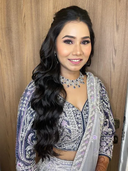 A smiling shot of my engagement bride. The makeup is bold yet elegant, designed to make her feel confident and beautiful on her special day.