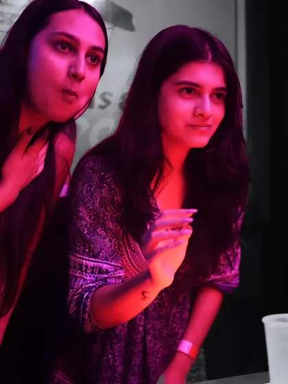 Guests focused on a game of beer pong. A great DJ set provides the soundtrack for all the fun happening in the club, not just on the dance floor.