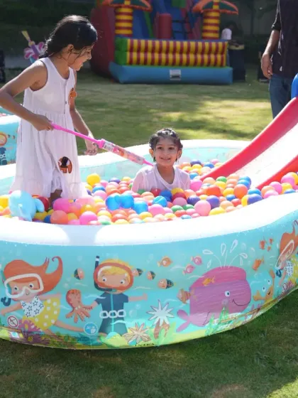This inflatable pool, complete with a small slide, is perfect for summer parties. We ensure all our rental equipment is clean, safe, and ready for hours of fun in the sun.