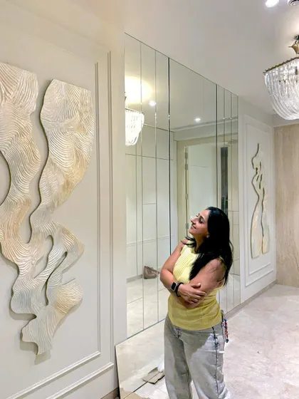 A moment of joy, seeing the artwork perfectly reflected in the mirrored wall of the client's home.