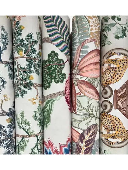Botanical prints, flora, fauna, and wildlife motifs are the highlight of the Ananda collection of wallpapers by Osborne & Little. These rolls showcase a variety of nature-inspired designs, perfect for creating a vibrant and layered interior.