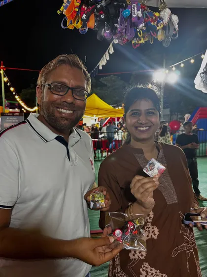 A happy couple showing off their new custom magnets at my stall. Live events are all about creating these instant memories.