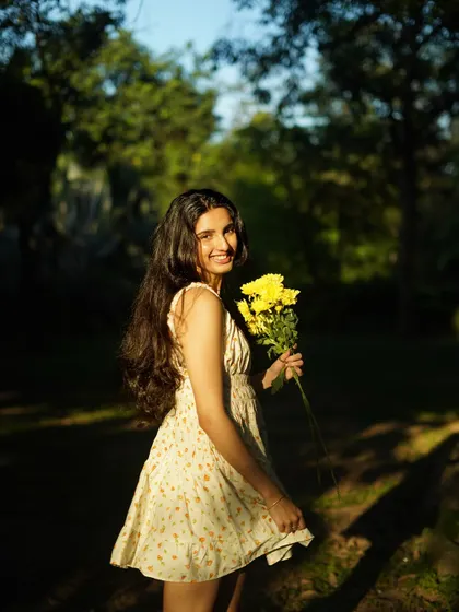 A playful, over-the-shoulder shot that shows the movement of the dress and hair. This kind of dynamic photo is perfect for lifestyle and fashion blogs.