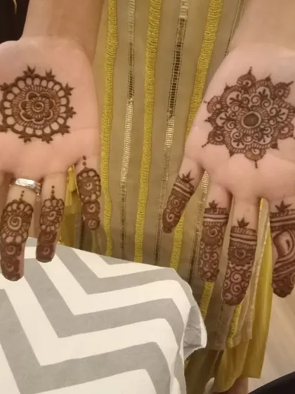 Simple and elegant mandala designs are perfect for guests who want beautiful henna without full coverage.
