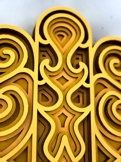 The intricate details of the Hamsa Hand's upper fingers are visible in this close-up. Each layer is precisely cut from durable HDMR MDF for a flawless finish.