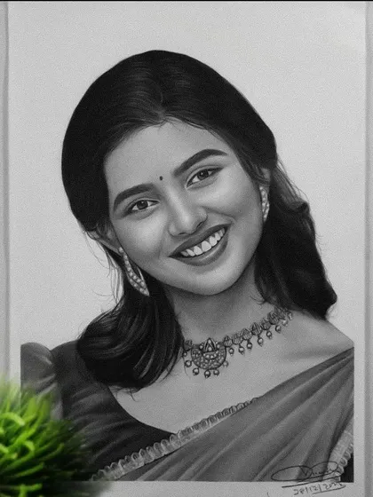 The final drawing of a South Indian actress from the movie "Premalo". The portrait is complete with detailed shading on her saree and jewelry.