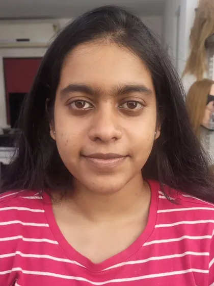 Before: Getting ready for a corrective makeup look to even the skin tone.