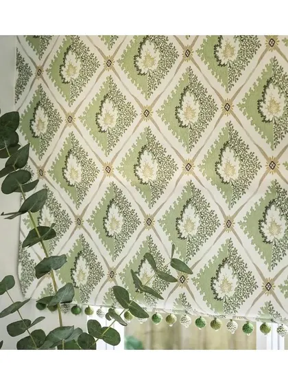 The Elsie fabric by Osborne & Little is a beautiful design which features leaves and foliage within a trellis. This elegant print is perfect for roman blinds, curtains, or light upholstery, adding a touch of structured, natural beauty.