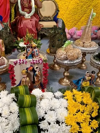 A close-up of a platter display with a beautiful floral arrangement in the foreground.