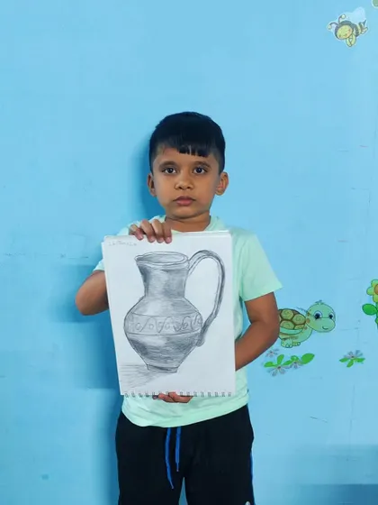 A beautifully executed pencil sketch of a jug. The student has skillfully captured the object's curves and decorative patterns.