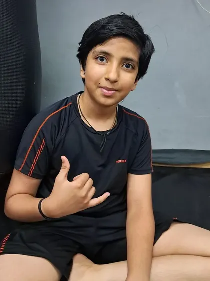 One of our young BJJ students, happy and confident after a training session.