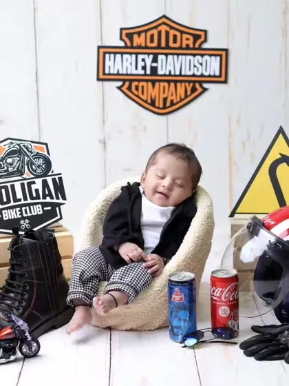 The complete biker setup, ready for the open road. This theme is a client favorite for creating a cool and memorable birth announcement.