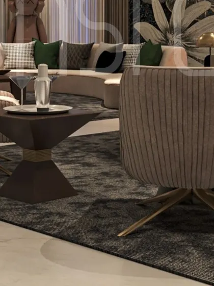 A close-up of the ribbed swivel chairs and geometric side table. The combination of textures and shapes adds a dynamic quality to this luxurious living room.
