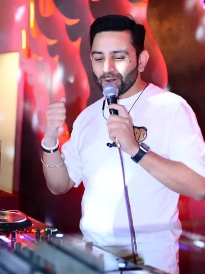 On the mic at Tipsy Bull, getting the crowd hyped for the next track.