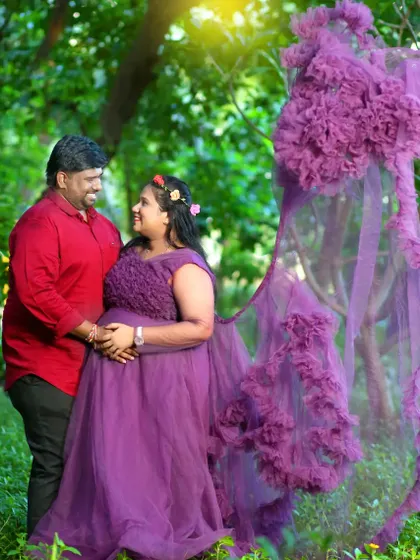 This purple maternity gown features a detachable ruffle tail that can be used to create dramatic, flying-fabric shots.