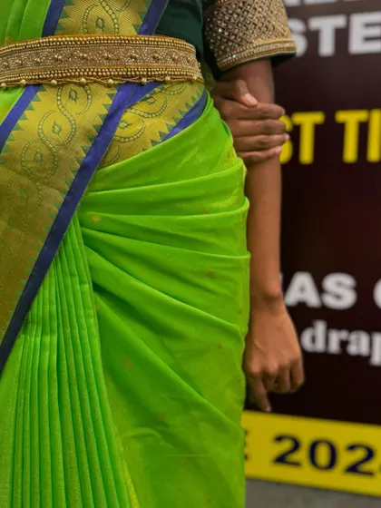 Another detailed shot of the hip pleats, a crucial part of the South Indian draping style.