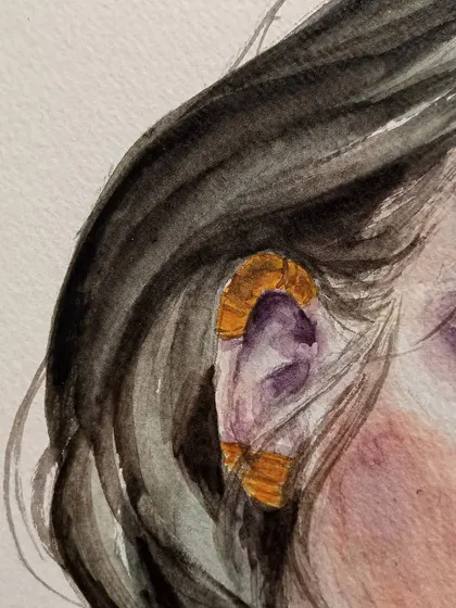 A duplicate detail shot of the ear and hair.