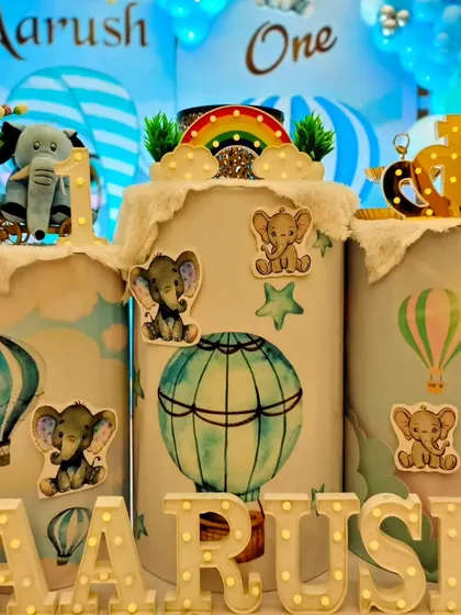 A close-up of the custom pedestals from a baby elephant themed party.