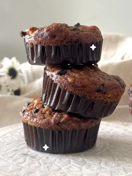 A leaning tower of my delicious banana chocolate muffins, ready to be enjoyed.