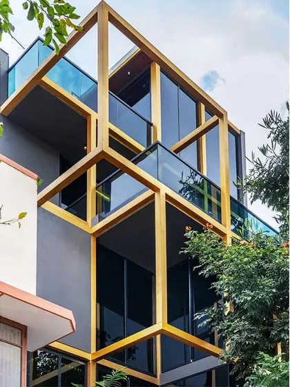 The interlocking cubes of the SOL House's steel frame create a series of balconies and terraces at different levels. This approach maximizes outdoor space on a narrow plot and gives the home a unique, three-dimensional quality.