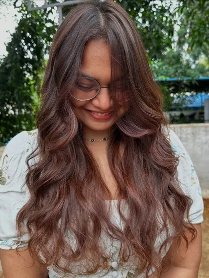'Ghar ki shaadi' ready. For family weddings, you want a look that is elegant and timeless, like these rich tones and soft waves.