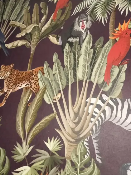 A detailed shot of the animals in the jungle wallpaper.