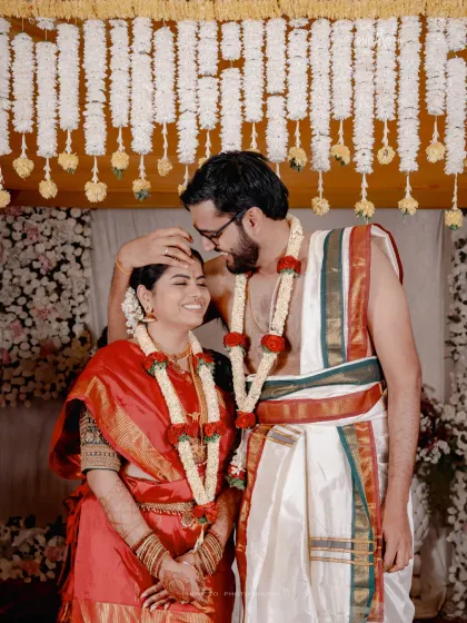A tender moment between the couple during their Iyengar wedding ceremony.