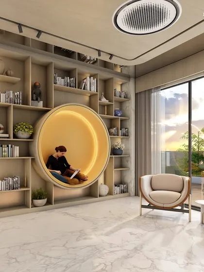 Another view of the library, showcasing the comfortable, modern furniture and large windows that flood the space with natural light. This clubhouse is not just a retreat but a statement of lavish living and distinguished tastes.
